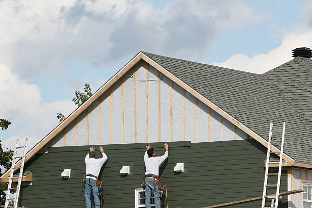 Professional Siding Replacement technician working in Owings Mills, MD
